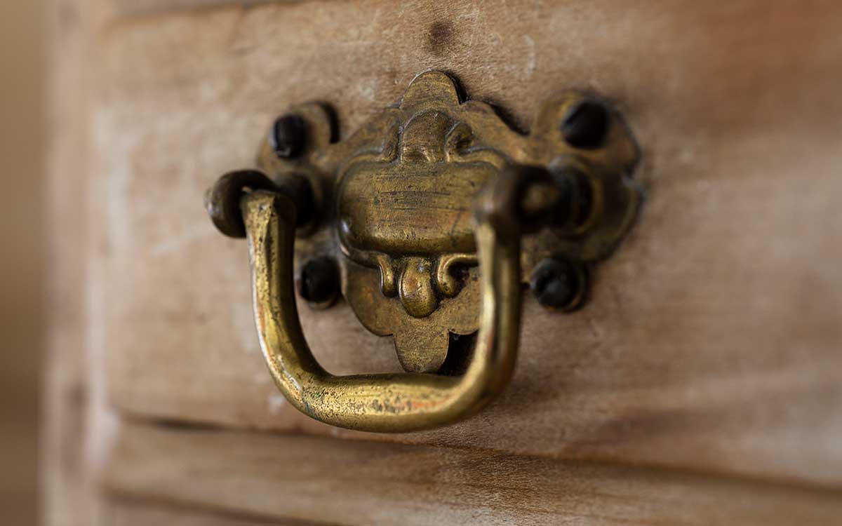 Brass handle on dresser