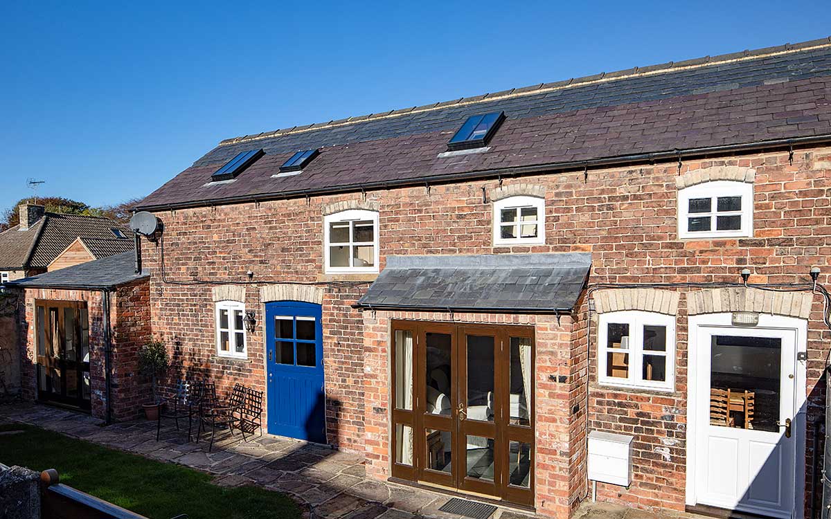 Stable Block exterior with patio doors closed